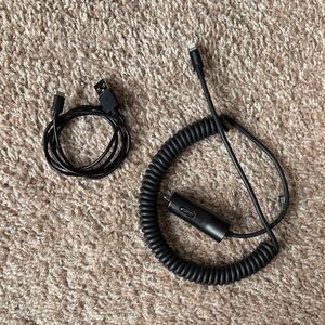 One Lightning to USB Charging Cable and one Verizon Coiled Car Charger